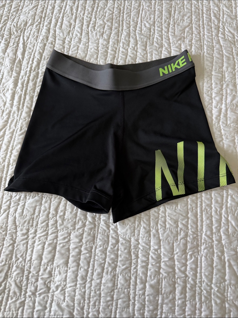 Nike Black Athletic Shorts with Neon Green Logo
